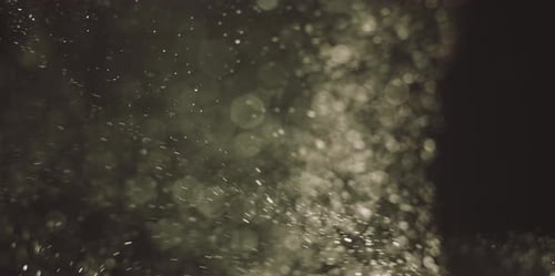 Abstract Particles and Bokeh on Dark Background