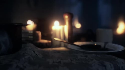 Warm Candlelight Table Setting with Lace Tablecloth