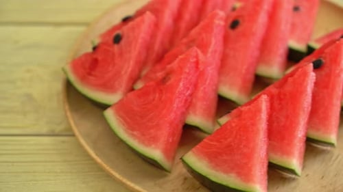 fresh watermelon sliced on plate