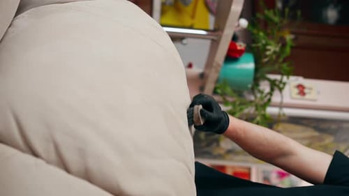 Vertical Video Close Up Professional Cleaning in an Apartment the Cleaner Cleans a Textile Sofa with