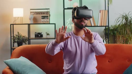 Man Wearing VR Headset Interacting with Technology