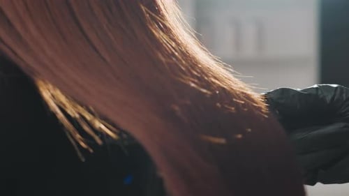 Woman Getting Hair Styled, Close Up