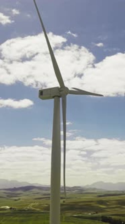 Blue sky, development and wind turbine outdoor in nature for production of alternative energy