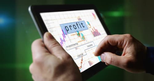 Profit business and income charts graphs on touchscreen pad display