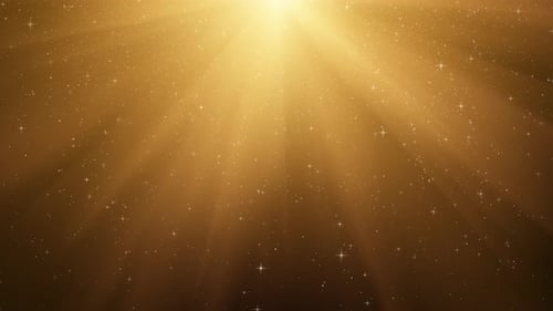 Radiant Golden Light Rays and Glittering Particles Background