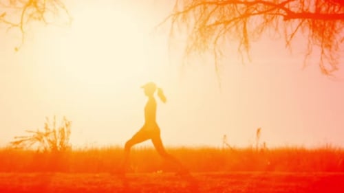 Woman Running/ Warming Up at Sunrise Action