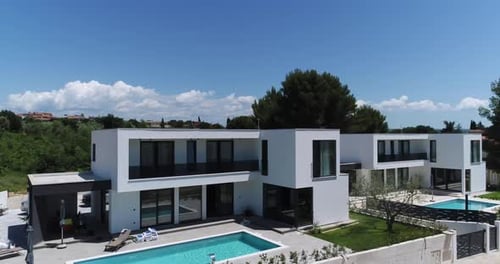Aerial Drone Shot of Two Identical Vacation Homes or Villas with Sea View