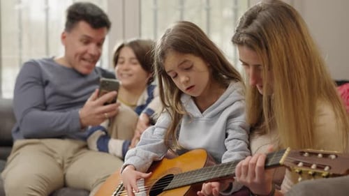 Family Bonding with Guitar Music at Home