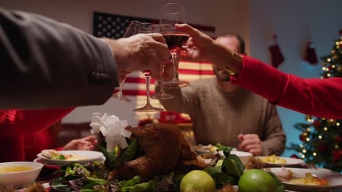 Family Celebrates Christmas Together with Festive Dinner