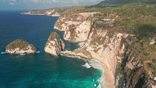Seafront Cliffs Of Diamond Beach In Nusa Penida, Bali Indonesia. Aerial Drone Shot
