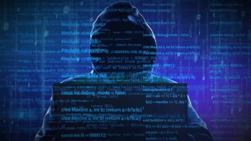 Futuristic Hacker Working on Computer with Blue Code Overlay