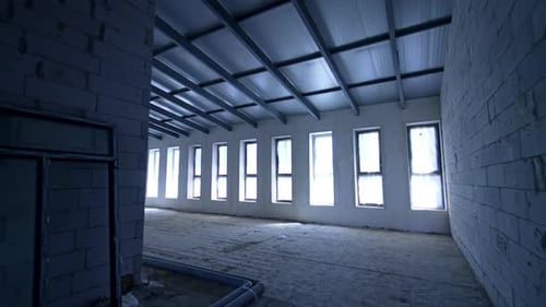 Empty Urban Interior with Row of Tall Windows