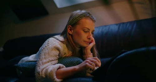 Woman Working on Digital Tablet Browsing Social Media