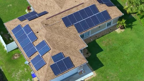 Photovoltaic Solar Panels on Florida Home Roof for Producing Clean Ecological Electric Energy