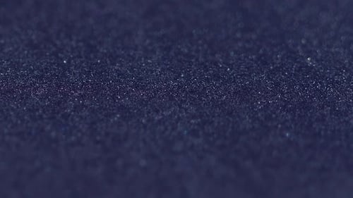 Blue Glitter Particle Macro Shot