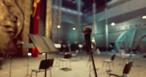 Empty Concert Hall Stage with Microphone and Music Stands Dolly Shot