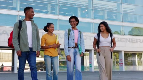 Diverse Group of Latin American Students Leaving Campus College After Classes