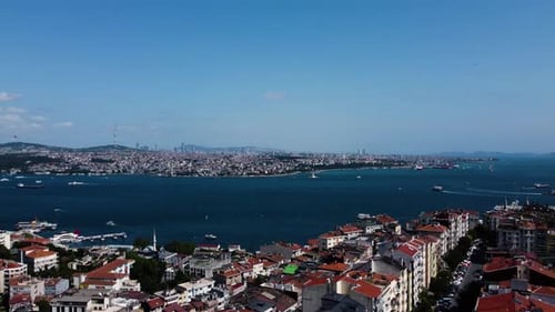 Clear day over Istanbul coastline, with the sparkling Bosphorus and cityscape, aerial