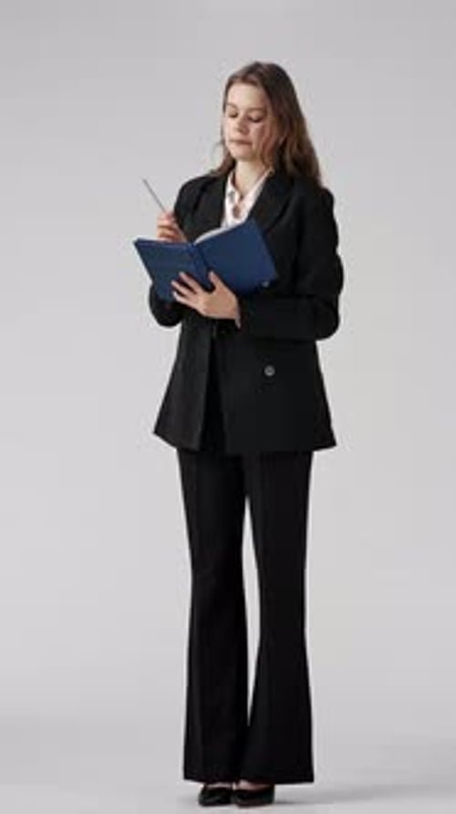 Professional Woman Thinking with Notebook and Pen in Hand Isolated on White Background