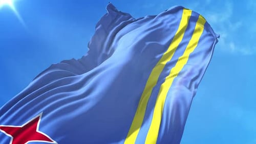 Realistic Waving Flag of Aruba with Bright Blue Sky and Sun Flare