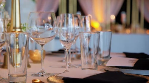 Close Up View of Restaurant Filled with Tables and Chairs and Candles on Them Wedding Event