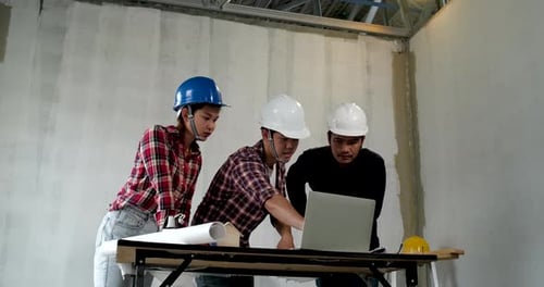 Group of young asian of building architect construction engineer have meeting