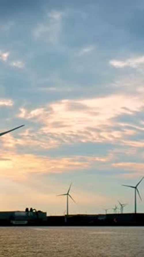 Wind Turbines in Antwerp Port on Sunset