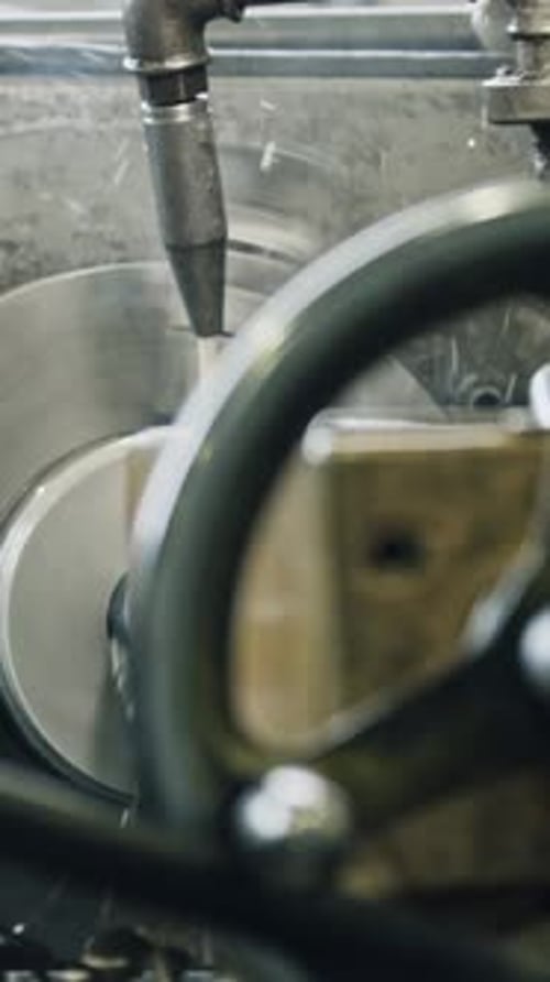 Precision metal machining by lathe operator in workshop