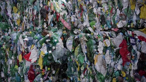 Compressed Plastic Bottles and Packaging Waste for Recycling