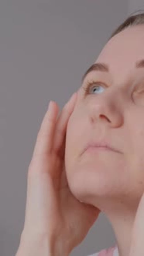 Tired Angry Woman Massaging Temples and Bridge of Nose Vertical Video