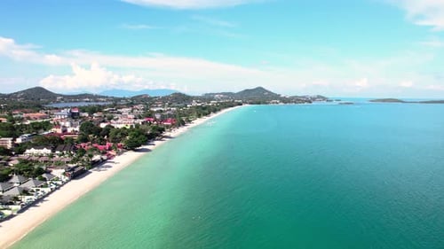 Fly along Chaweng beach Koh Samui, Koh Phangan in background