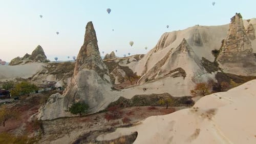 Colorful Hot Air Balloon In Scenic Landscape Of Cappadocia In Turkey - Aerial FPV