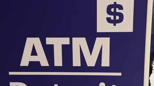 ATM Service Sign Indicative of Automated Banking at a Retail Location Offering Convenient Access to