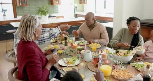 Family Enjoying Holiday Meal at Home Together