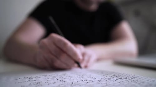 Creative Journaling: Man Working from Home Office