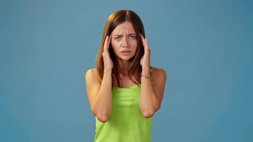 Young Woman Experiencing a Headache