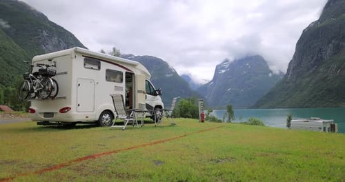 Camper Van in Scenic Mountain and Lake Setting