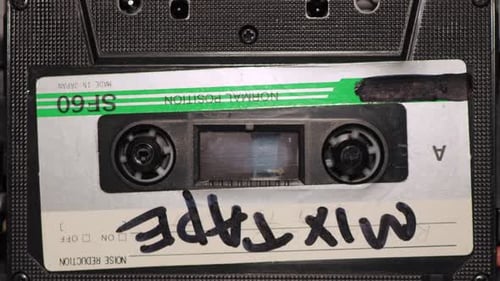 Audio Cassette Mix Tape Playing in Tape Deck Player – Recorder. Vintage Retro Music. Scene A. Front