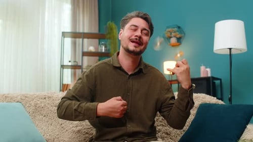 Middleaged Man Air Guitar Playing Enthusiastic Moves Pretend Rock Music Energetic Fun Joyful Vibe