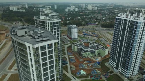Construction site of a new city block. Construction of multi-storey buildings.