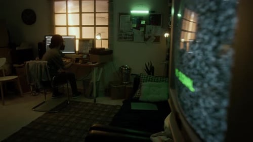 Man Working on Computer in Retro Room