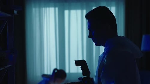 Investigators Photographing Crime Scene in Dark Room