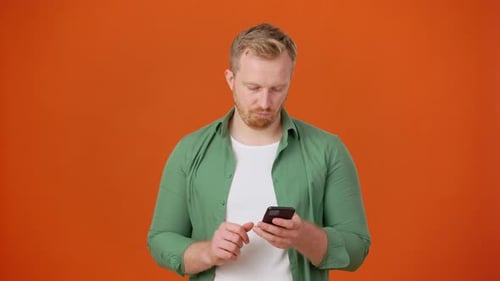 Man Checks Content of Money From Casino on Mobile Phone