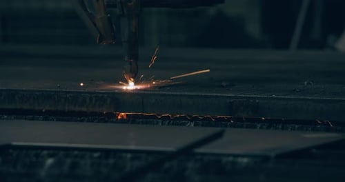 Plasma Cutting Robot Cutting Metal in Factory