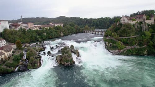 Dynamic Aerial of Rhine Falls, most powerful waterfall in Europe, Switzerland