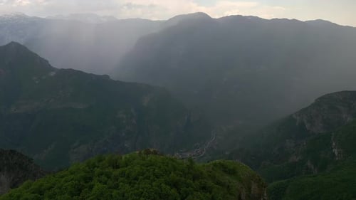 Majestic Mountain Range Aerial View with Mist