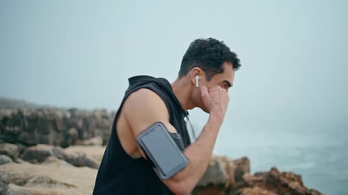 Strong Boxer Workout Seaside Closeup Professional Athlete Punch Air on Cliff