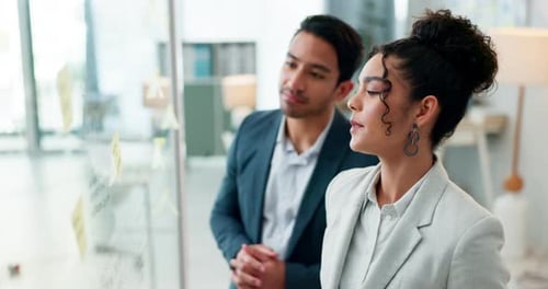 Planning, teamwork and business people writing in office for calendar, agenda