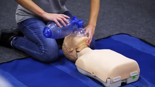 Bag Valve Mask Training on Medical Manikin