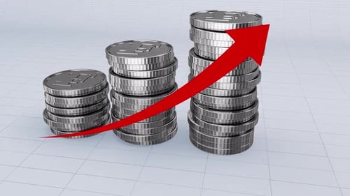 A Pile Of Franc Silver Coins With Prices Growing Up